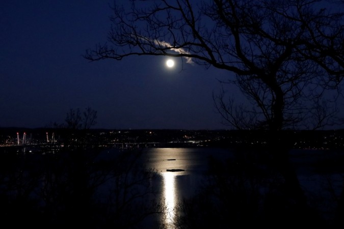 A 'supermoon' full moon is seen above the Hudson River and the Mario M. Cuomo Bridge from Nyack, New York, U.S., January 1, 2018. Supermoon 2018