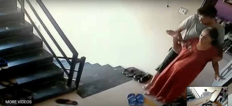 The shocking video footage shows the son dragging his mother upstairs. Son kills mother off the building
