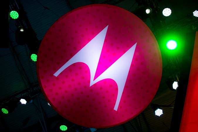 A Motorola logo hangs from a beam during the Mobile World Congress on the third day of the MWC in Barcelona, on March 1, 2017. Phone makers will seek to seduce new buyers with artificial intelligence functions and other innovations at the world's biggest mobile fair starting today in Spain. SPAIN-TELECOM-MOBILE-WORLD-CONGRESS