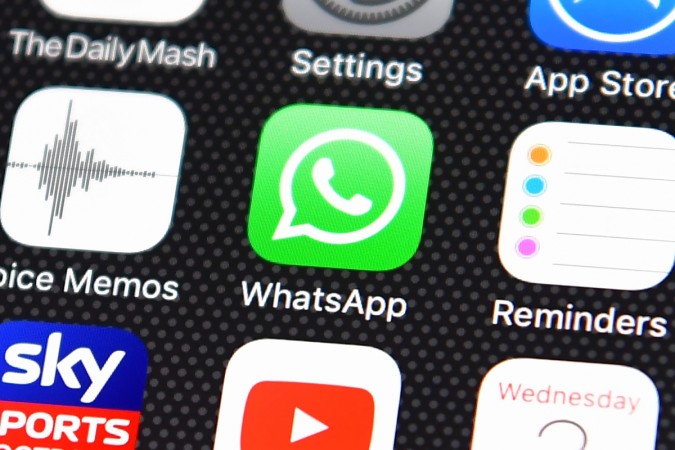 LONDON, ENGLAND - AUGUST 03: The Whatsapp app logo is displayed on an iPhone on August 3, 2016 in London, England. Popular Smart Phone Apps Of 2016