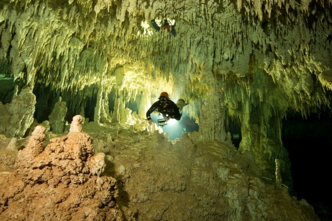A scuba diver measures the length of Sac Aktun underwater cave system as part of the Gran Acuifero Maya Project near Tulum, in Quintana Roo state, Mexico January 24, 2014. World's Largest Underwater Cave