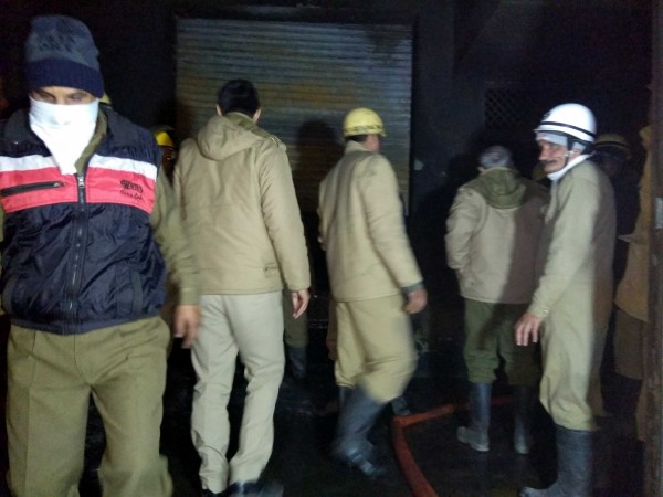 Firefighters in a warehouse in West Delhi's Bawana Industrial Area, where a fire broke out killing at least seventeen persons on Jan 20, 2018. BAWANA FIRE