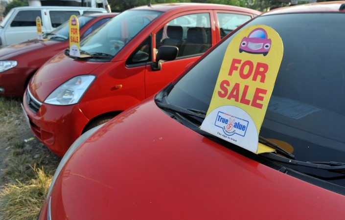 Used cars are parked at the 'Car Carnival' organized to woo buyers during the festive season in Mumbai on October 10, 2011. Second hand cars, pre-owned cars, used cars