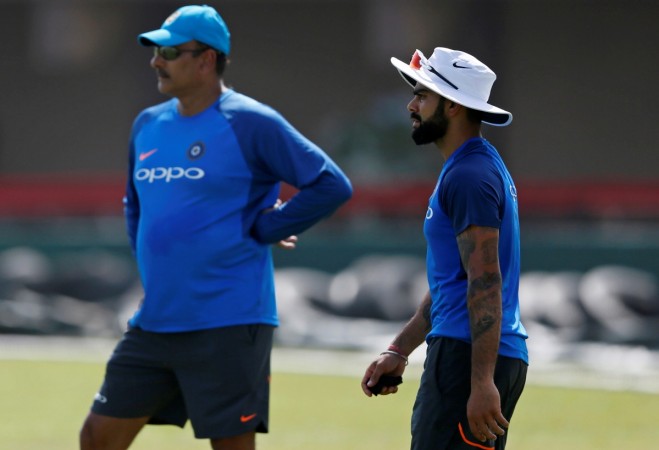 File photo: Ravi Shastri (left) and Vira Kohli during a training session. Ravi Shastri Virat Kohli