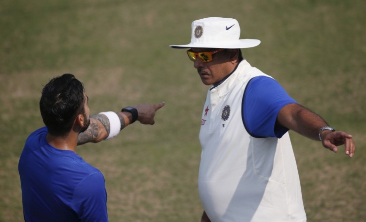 Virat Kohli (left) and Ravi Shastri pointing towards different reasons for India's debacle in South Africa. Ravi Shastri Virat Kohli