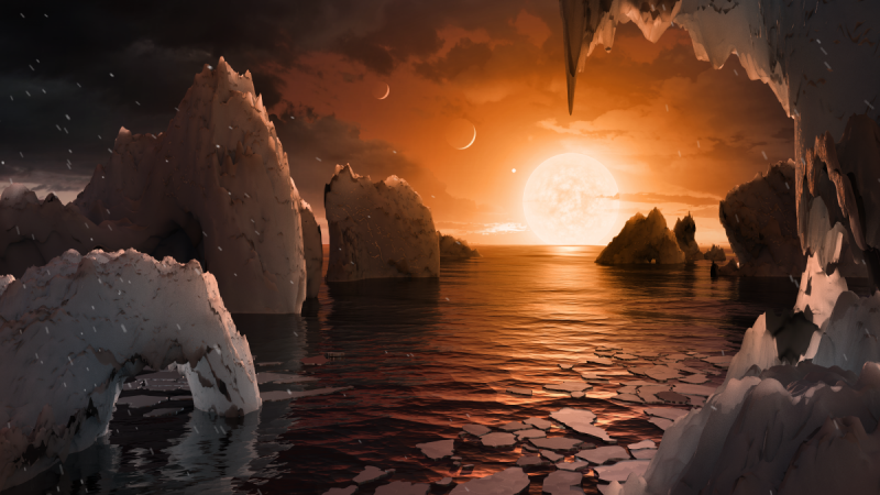This illustration shows the possible surface of TRAPPIST-1f, one of the newly discovered planets in the TRAPPIST-1 system. TRAPPIST-1
