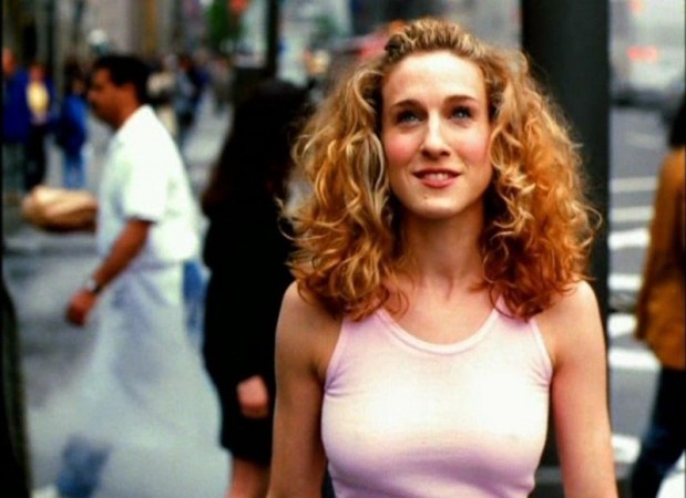 Sarah Jessica Parker as Carrie Bradshaw, in the opening credits of Sex and The City. Sarah Jessica Parker as Carrie Bradshaw, in the opening credits of Sex and The City.