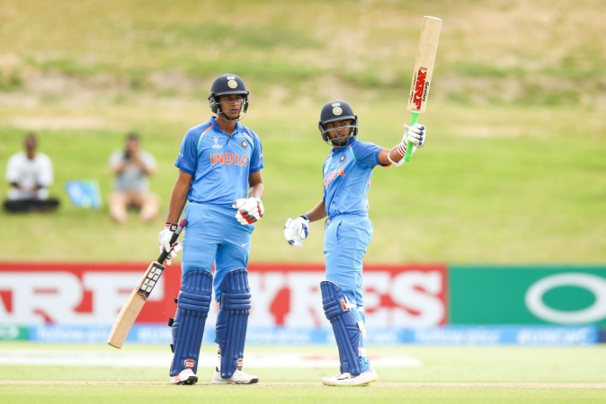 India's team poses to celebrate their victory in the U19 cricket World Cup final match between India and Australia at Bay Oval in Mount Maunganui on February 3, 2018. India at U-19 World Cup 2018