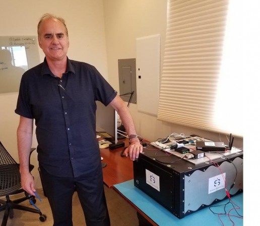 Brian Barnett with Solstar Space Co's Schmitt Space Communicator. Brain Barnett SSC