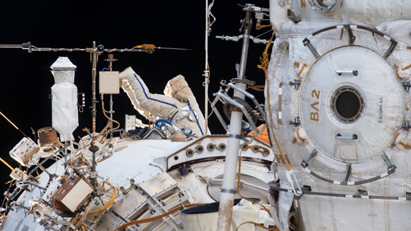 A Russian spacewalker is seen in an Orlan spacesuit with blue stripes (center image) working outside the Zvezda service module during the longest spacewalk in Russian space program history on Feb. 2, 2018. A Russian spacewalker is seen in an Orlan spacesuit with blue stripes (center image) working outside the Zvezda service module during the longest spacewalk in Russian space program history on Feb. 2, 2018.