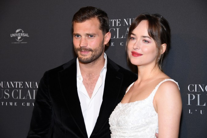 Jamie Dornan and Dakota Johnson attend 'Fifty Shades Freed - 50 Nuances Plus Claires' Premiere at Salle Pleyel on February 6, 2018, in Paris, France. Jamie Dornan and Dakota Johnson
