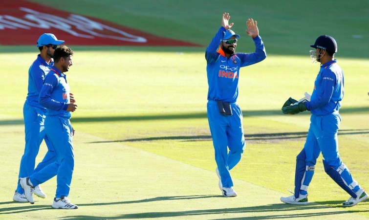 India captain Virat Kohli and MS Dhoni (right) celebrate a wicket during the third ODI against South Africa in Cape Town on Wednesday (February 7). Virat Kohli MS Dhoni