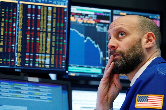 A trader reacts as he watches screens on the floor of the New York Stock Exchange in New York on Feb 5, 2018. wall street