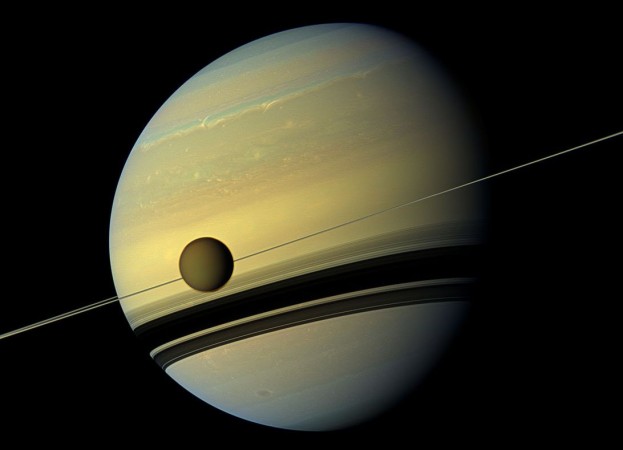 Natural color view of Titan and Saturn from NASA's Cassini spacecraft. Saturn moon Titan