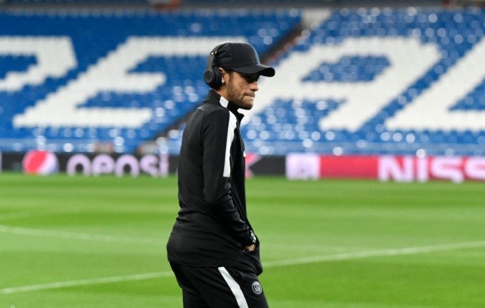 Paris Saint-Germain's Brazilian forward Neymar walks on the pitch at the Santiago Bernabeu stadium in Madrid on February 13 neymar