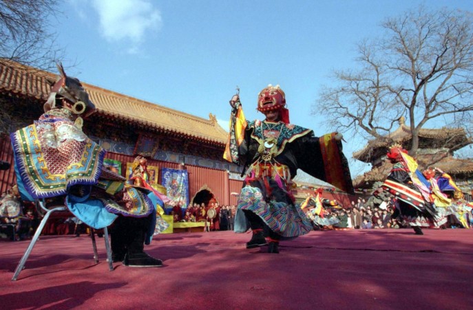 Buddhist monks perform at Beijing's Yong He Gong Temple, to herald in the Tibetan New Year, Losar Losar