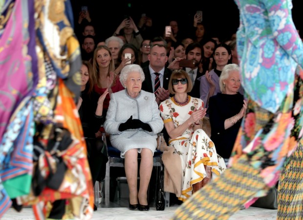 Britain's Queen Elizabeth II sits next to Vogue Editor-in-Chief Anna Wintour during the London Fashion Week. Britain's Queen Elizabeth II sits next to Vogue Editor-in-Chief Anna Wintour during the London Fashion Week.