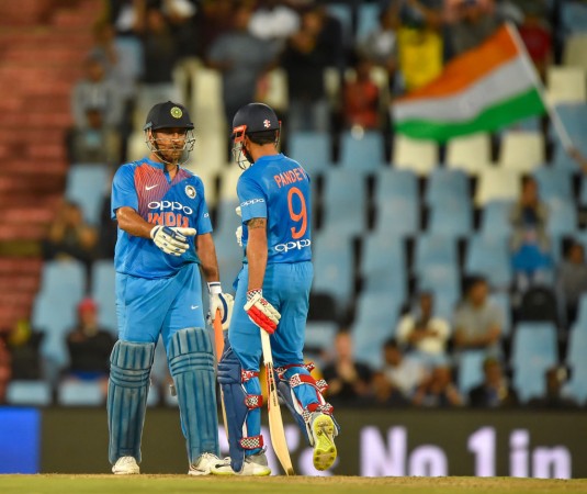 Manish Pandey (L) celebrates his half century with MS Dhoni during the second T20I on February 21. MS Dhoni