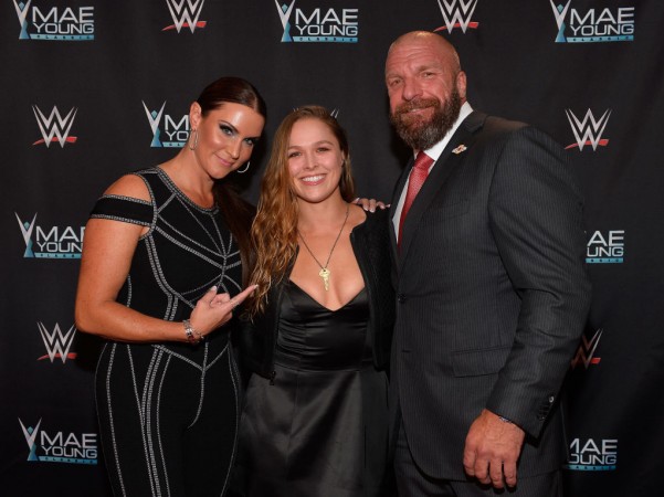 Rounda Rousey faced Triple H and Stephanie McMahon at WrestleMania 34. Ronda Rousey Triple H