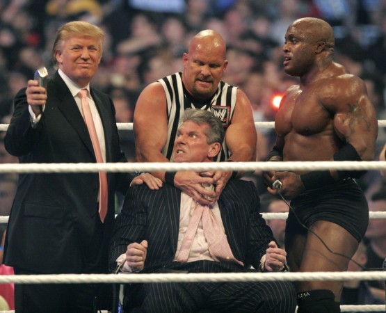 WWE chairman Vince McMahon (C) prepares to have his head shaved by Donald Trump (L) and Bobby Lashley (R) while being held down by ''Stone Cold'' Steve Austin after losing a bet in the Battle of the Billionaires at the 2007 World Wrestling Entertainment's Wrestlemania at Ford Field on April 1, 2007 in Detroit, Michigan wwe, donald trump, bobby lashley