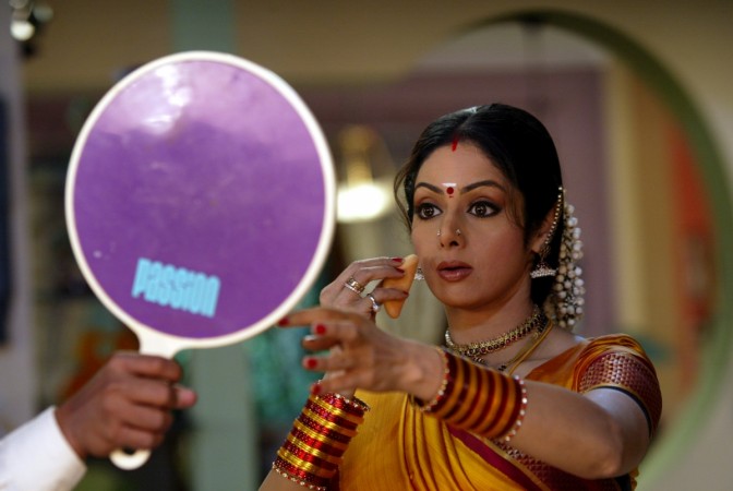 Bollywood star Sridevi checks her make-up during the making of a television serial sridevi