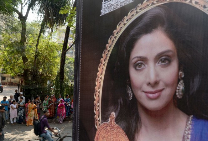 A picture of Bollywood actress Sridevi Kapoor is seen put up outside her residence in Mumbai on February 26, 2018, following her death. Sridevi Kapoor