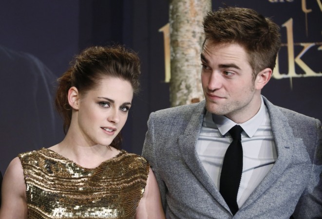 Cast members Robert Pattinson (R) and Kristen Stewart pose for pictures before the German premiere of The Twilight Saga: Breaking Dawn Part 2 in Berlin, November 16, 2012. Cast members Robert Pattinson (R) and Kristen Stewart pose for pictures before the German premiere of The Twilight Saga: Breaking Dawn Part 2 in Berlin, November 16, 2012.