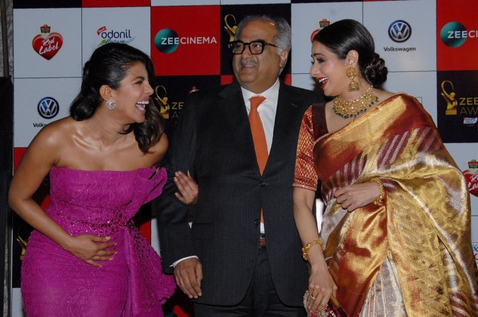 Priyanka Chopra (L) Boney Kapoor (C) and Sridevi (R) at the Zee Cine Awards 2018 ceremony in Mumbai on December 19, 2017. Priyanka Chopra with Sridevi and Boney Kapoor