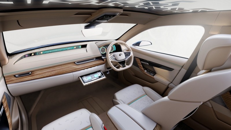 The interior gets a bright beige inlay and glass roof offers more natural lights inside cabin. Tata E-Vision concept