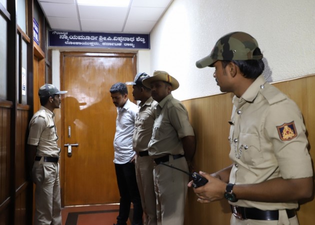 Security beefed outside the chamber of Karnataka Lokayukta Justice Vishwanath Shetty after he was stabbed at his office in Bengaluru on March 7, 2018. vishwanath shetty- lokayukta