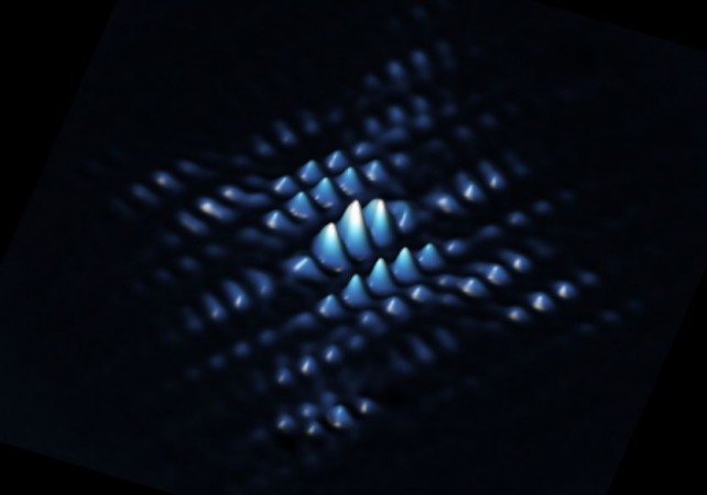 An image showing the electron wave function of a qubit made from a phosphorus atom precisely positioned in silicon. An image showing the electron wave function of a qubit made from a phosphorus atom precisely positioned in silicon