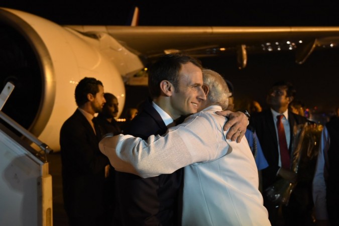 French President greeted by Narendra Modi at the airport. macron