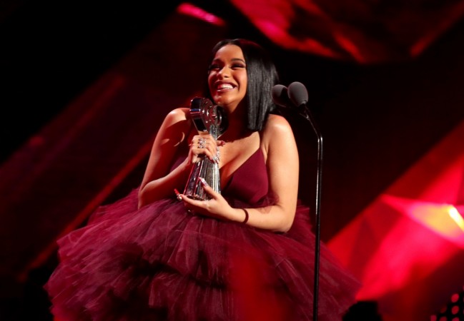 Cardi B accepts Best New Artist onstage during the 2018 iHeartRadio Music Awards. cardi b