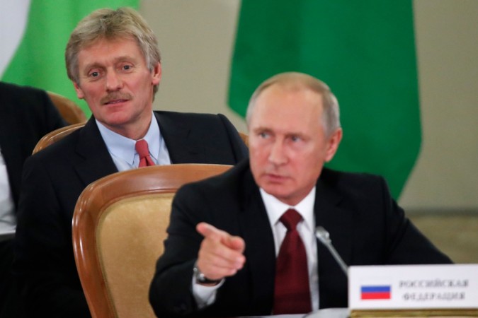 Russia's President Vladimir Putin (front) and Kremlin spokesman Dmitry Peskov attend a session of the Council of Heads of the Commonwealth of Independent States (CIS) in Sochi on October 11, 2017. Russia's President Vladimir Putin (front) and Kremlin spokesman Dmitry Peskov attend a session of the Council of Heads of the Commonwealth of Independent States (CIS) in Sochi on October 11, 2017.