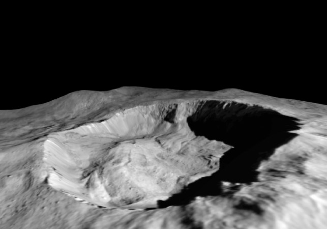 This view from NASA's Dawn mission shows where ice has been detected in the northern wall of Ceres' Juling Crater, which is in almost permanent shadow Ceres