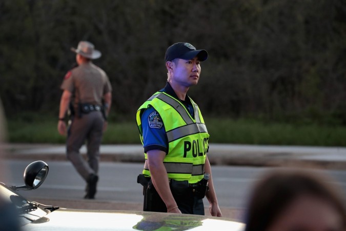 Police secure the area after one person was injured by a package containing an incendiary device at a nearby Goodwill store on March 20, 2018 in Austin, Texas. Austin bombing
