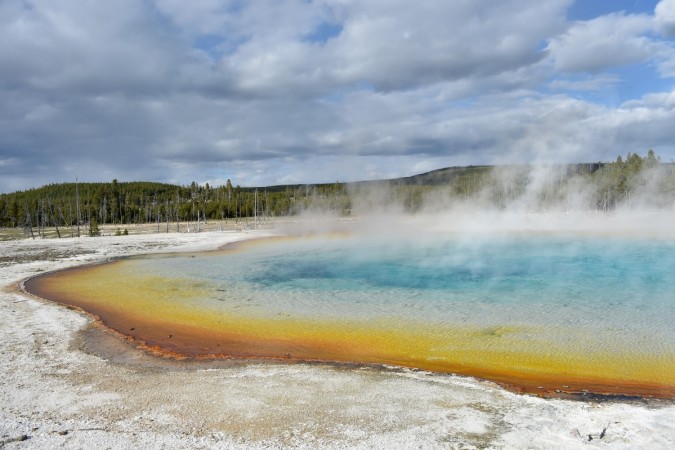 A view of a hot spring at the Upper Geyser Basin at Yellowstone National Park. A view of a hot spring at the Upper Geyser Basin at Yellowstone National Park.