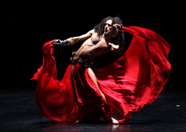 Lebanese artist Alexandre Paulikevitch dances during his 'Tajwal' (wanderings) performance at a theatre in Beirut, late on December 3, 2011. Lebanese male belly dancer