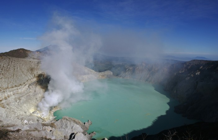 A general view of Kawah Ijen volcanic crater and the sulphur mines located at its foot in East Java. Mount Ijen