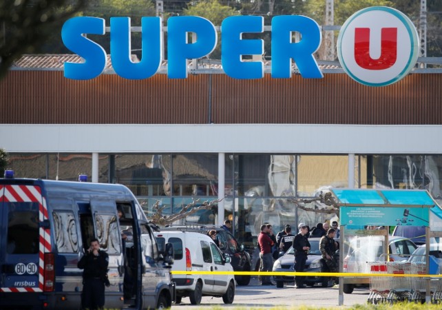 A general view shows gendarmes and police officers at a supermarket after a hostage situation in Trebes, France, March 23, 2018. France hostage