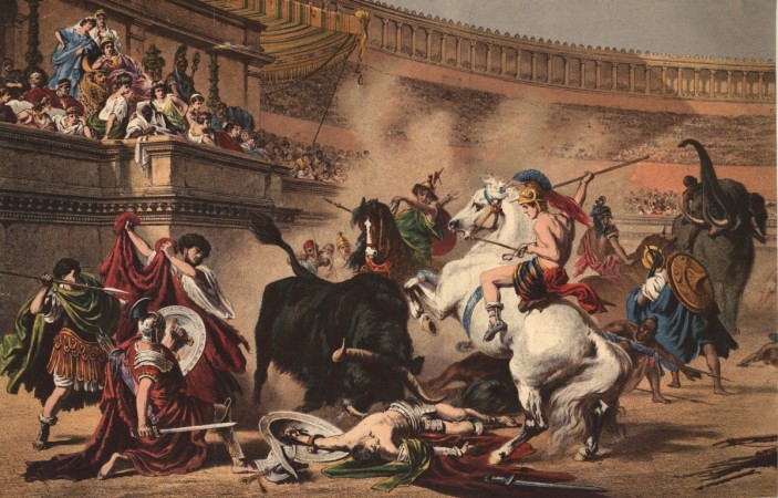 Circa 100 BC, Gladiators riding elephants and horses battle a bull in a Roman amphitheatre Gladiators fighting in the arena