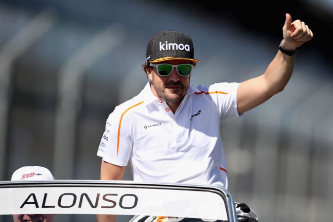 Fernando Alonso of Spain and McLaren F1 gives the crowd a thumbs up on the drivers parade before the 2018 Australian Formula One Grand Prix Fernando Alonso