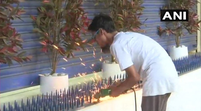HDFC Bank removing iron spikes after social media outrage HDFC removes iron spikes