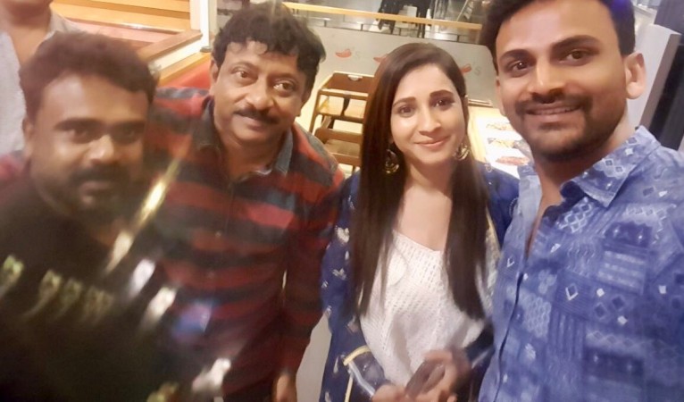Ram Gopal Varma with director Duniya Soori, Manvitha Harish and Dhananjay. Ram Gopal Varma watches Tagaru