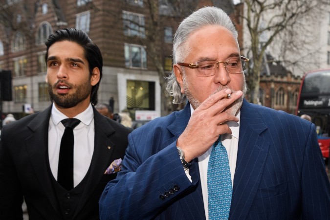 Vijay Mallya walks through the press with his son Siddharth Mallya (L) Vijay Mallya to tie the knot with Pinky Lalwani