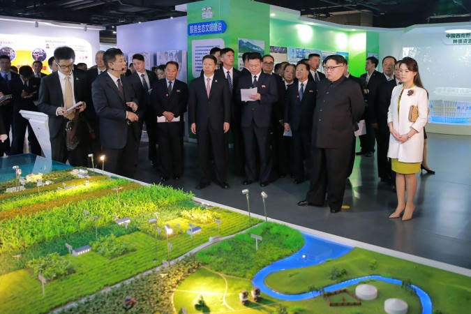 Ri Sol-ju impresses fashion lovers dressed in a green dress and white jacket Ri Sol-ju