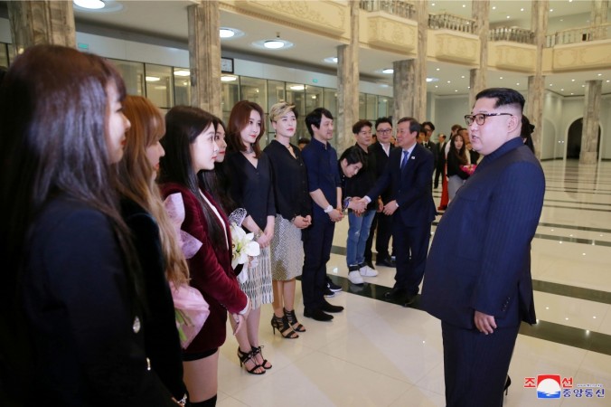 North Korean leader Kim Jong Un meets South Korean K-pop singers in this photo released by North Korea's Korean Central News Agency (KCNA) in Pyongyang April 2, 2018. Kim Jong-un