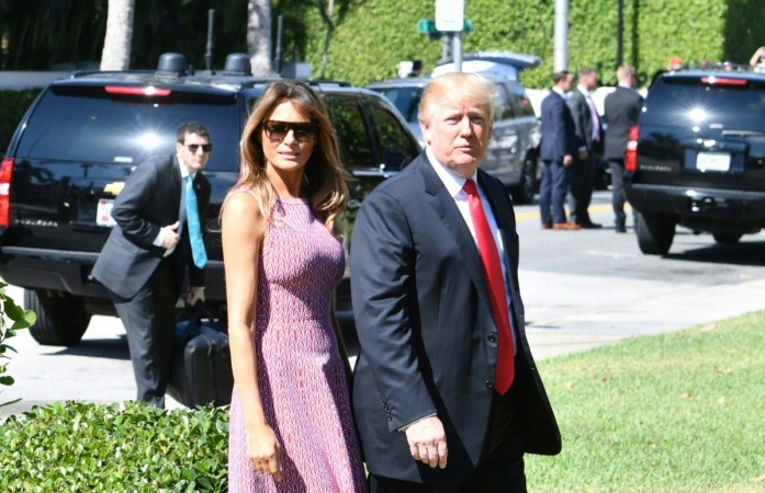 US President Donald Trump (R) and First Lady Melania Trump (L) arrive for Easter service at the Church of Bethesda-by-the-Sea in Palm Beach, Florida, April 1, 2018. Melania Trump