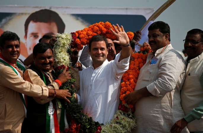 A garland was flung at Rahul Gandhi during a roadshow in Karnataka. Rahul gandhi