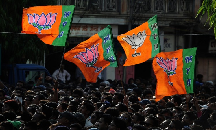 A BJP MLA from Rajasthan has urged Hindu families to not allow Muslims inside their home. bjp flag